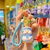 Nova empresa criativa de resina para cross-dressing chaveiro de pato boneca de moda fofa e requintada chaveiro de carro pingente de chave