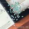 Rhinestones cúbicos de circonia con forma de rombo plano para decoración de uñas, un diseño popular y moderno con patrones de copo de nieve y bordes biselados, para decoración de uñas
