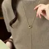 Colar vintage oval de olho de tigre, uma peça de nicho e sofisticada com design minimalista, perfeito como corrente para suéter para outono e inverno, adicionando um toque de elegância a qualquer look.