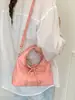 Bolso de mujer de nicho minimalista estilo coreano modelo 2026, bolso cruzado de moda, alto atractivo estético, bolso de mano casual moderno, bolso tipo dumpling