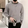 Suéter de punto grueso de cuello redondo nuevo para hombre de Primavera y Otoño, suéter a cuadros versátil, de manga larga ajustado, moda