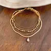 Colar de pérolas multicamadas vintage francês, luxo leve, moda de alta qualidade, corrente requintada para clavícula, acessório de nicho único e versátil