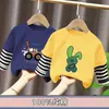 Camiseta de manga larga de algodón puro para niños 2026 primavera/otoño nuevo estilo para niños cuello redondo camiseta básica elegante top a rayas de imitación de dos piezas