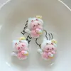 Accesorios de resina de gatito de dibujos animados clip para el pelo de gel de crema joyería DIY pegatina para refrigerador cadena para teléfono móvil agujero material para zapatos al por mayor