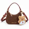 Nueva Mini Bolso de Axila Infantil para Niñas Bolso de Mano de Media Luna Bolso Pequeño con Colgante de Oso Lindo Bolso para Viaje de Bebé