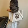 Bolsa Casual de Lona de Nylon Feminina Grande Capacidade Bolsa de Mão para Estudante Simples Versátil Bolsa Tote de Ombro Único para o Dia a Dia