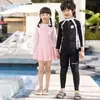 Traje de baño mediano y grande para niños y niñas, pantalones largos de manga larga, nuevo, protección solar, secado rápido, traje de buceo dividido, traje de baño