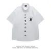 Camisa de estilo retro japonés con bordado de cachorro y cuello tipo polo para hombre y mujer, de verano, holgada, moderna, estilo universitario, versátil