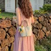 Bolso de mano de verano para mujer 2026 nueva moda coreana de nicho tipo cubo bolso bandolera súper popular