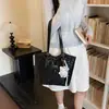 Bolsa feminina moderna transfronteiriça 2026 verão nova popular bolsa tote de grande capacidade, bolsa de ombro versátil e elegante para o dia a dia