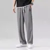 Pantalones de seda de hielo Amazon transfronterizos, pantalones cortos de secado rápido para hombre, pantalones largos casuales de estilo coreano modernos de corte holgado, pierna ajustada atlética