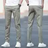 Pantalones casuales de verano nuevos, pantalones para hombre estilo K, pantalones modernos holgados de pierna recta para jóvenes, de algodón puro elástico color blanco hueso para hombre