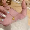Xiaohongshu Estilo Chinês Novo Tendência Nacional Corrente de Clavícula em Forma de Coração Dourado Escovado Colar Minimalista de Luxo Leve Atacado