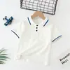Nueva camiseta infantil transfronteriza versátil para niños medianos y grandes, verano, moda coreana, polo de manga corta, camiseta infantil