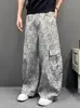 Novos Jeans Vintage Estampados de Leopardo para Homem Primavera 2026, Lavados e Desgastados, Casuais de Perna Larga Reta Soltos, Calças Curvas