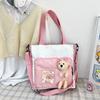 Bolsa Tote de Mão para Estudante Estilo Coreano Boneco Ursinho Desenho Animado Estilo Acadêmico Colorida Tendência Bolsa de Brinquedo Casual Bolsa de Ombro