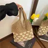 Bolsa Tote de Tricô Vazado Estilo Preguiçoso Feminina 2026 Nova Moda Grande Capacidade Bolsa de Tricô Bolsa de Ombro para Férias na Praia