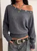 Suéter de punto de moda europeo y americano para mujer, con botones, hombros descubiertos, nuevo para otoño e invierno, suéter holgado con cuello murciélago