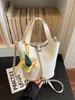 Bolso de mano tipo cubo de cuero suave simple estilo coreano para mujer, Nuevo modelo 2026, Bolso de hombro cruzado, Bolso tote pequeño súper popular para salir