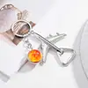 Abrebotellas de avión transfronterizo llavero colgante de llavero accesorio creativo para bolsa de coche en stock al por mayor acrílico