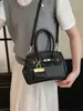 Elegante bolsa pequena de um ombro para mulheres, nova bolsa transversal versátil primavera/verão 2026, bolsa de mão requintada, moderna e da moda