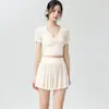 Conjunto de yoga de malla retorcida de manga corta para mujer, minifalda plisada de cintura alta, conjunto de dos piezas de secado rápido para fitness y danza