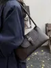 Bolsa baguette de nicho super popular para outono e inverno, novo estilo 2026 para mulheres, bolsa de ombro única/sob o braço da moda para o trabalho, bolsa de mão para atividades ao ar livre