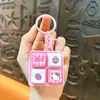 Llavero Colgante Teclado de Cuatro Teclas Luminoso y Sonoro Alivio del Estrés Juguete Estudiantil Accesorio para Bolsa Regalo Venta al por Mayor