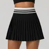 Nueva falda plisada de tenis de cintura alta para otoño e invierno para mujer, minifalda deportiva de bádminton con bolsillos, falda falsa de dos piezas anti-exposición