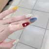 Flor Pequeña Cremosa Azul Súper Brillante Ojo de Gato Estilo Corto Uñas Portables Completamente Hechas a Mano Pegatinas de Arte para Uñas Completamente Hechas a Mano Piezas de Uñas Postizas