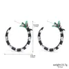 Periféricos de Cinema e Televisão Transfronteiriços Demônio Mestre 2 Desenho Animado Pingente de Metal Chaveiro Pulseira Brincos de Costura Preto e Branco