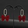 Aretes de Moño Rojo Súper Lindos Reunión Anual de Navidad Nicho Elegante Princesa Lujo Celebridad Aretes Franceses para Cena