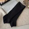 Calcetines holgados de tubo recto para mujer otoño invierno calcetines largos de punto retro calentadores de piernas adelgazantes versátiles calcetines de café a media pantorrilla