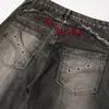 Elegantes jeans de mezclilla con patchwork de bordes crudos desgastados y orejas de gato para hombre, pantalones acampanados sueltos de pierna ancha para uso casual y resistente