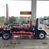 Fabricante de Camión de Basura Removible para Compartimento de Chasis Pesado Sinotruk Haoman Marca Azul Transportador de Residuos de Construcción