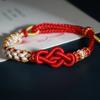 Cuerda de mano de flor de durazno tejida a mano diy Nudo Ruyi Cuerda roja Pulsera de este año Pulsera con colgante de cera de abeja dorada para llevar