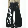Jeans preto de alta rua americana 2026 outono, novo, estampado com asas, para homens e mulheres, corte solto, multi-bolsos, barra curva