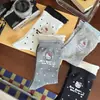 Calcetines nuevos de primavera y verano para mujer con diseño de gato KT de dibujos animados y lunares, dulces y lindos, con colores contrastantes, puño de canalé doble, diseño de letras estiloso, al por mayor