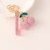 Llavero Creativo Lindo de Fruta Cereza de Aleación con Pedrería Colgante para Bolso Accesorios de Regalo Transfronterizos