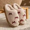 Pantuflas de algodón con lazo para niñas de invierno, pantuflas lindas de felpa de pelo largo engrosadas para mujer, suela suave antideslizante para interiores