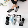 Calcetines invisibles de malla para primavera y verano tipo barco calcetines de rayas de arroz calcetines invisibles de silicona para hombre fabricantes al por mayor