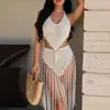 Comercio exterior transfronterizo, tejido a mano puro, con diseño de conchas, top calado con borlas largas, minifalda sexy, conjunto para vacaciones en la playa