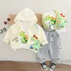Conjunto de Tres Piezas de Dinosaurio de Dibujos Animados para Bebé Nuevo Estilo Primavera y Otoño 2025 Sudadera con Cremallera Casual para Niños y Niñas Pantalones Deportivos para Bebé