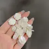 Pendientes de Borlas Estilo Francés Super Hada Pequeños Frescos Explosivos Moda Temperamento Lujo Ligero Alto Sentido Joyería Delicada de Oreja de Camelia