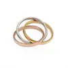 Anel Simples de Aço Inoxidável com Três Anéis e Três Cores de Titânio, Anel de Aço Titânio Fashion Tendência Combinação Sansheng III Anel de Ouro 18K