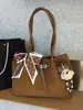 Bolsa Retro Versátil de Gran Capacidad Nueva Primavera 2026 Bolso de Hombro para Mujer Bolso Tote de Alta Calidad para Viajes
