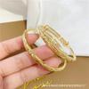 Pulsera de estrellas de lluvia de meteoros doradas chapadas en latón, pulsera Baifu, pulsera de dragón y fénix, pulsera de felicidad de dos mundos, venta directa al por mayor de fábrica