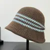 Nuevo sombrero de cubo hueco versátil estilo coreano para mujer, mezcla otoño/invierno, cálido, a rayas, protector solar y de sombra, al por mayor