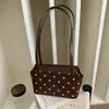 Bolsas de Alta Gama para Mujer 2026 Nuevo Bolso de Hombro para el Trabajo con Lunares Bolso de Hombro de Moda Diseño Sencillo de Nicho
