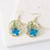 Explosión transfronteriza de hiedra, textura de lujo ligero, aretes de flor seca, creativos, flor real, regalo de flor real, flor eterna, aretes de resina
